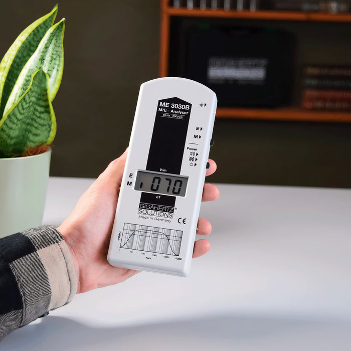 EMF Reader being held at home measuring elf