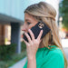 DefenderShield™ 5G EMF Protection iPhone 11 Series Phone Case being used by a women outside in the UK