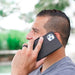 DefenderShield™ 5G EMF Protection iPhone 11 Series Phone Case being used by a man outside in the UK
