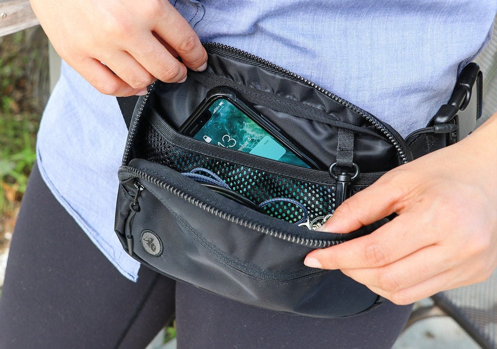 EMF Fanny Pack being used outdoors by a women