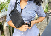 EMF Fanny Pack being used outdoors by a women