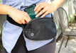 EMF Fanny Pack being used outdoors by a women