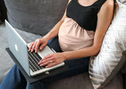 EMF Belly Band worn whilst women working on laptop