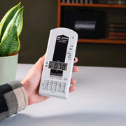 EMF Reader being held at home measuring elf