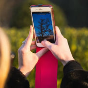 EMF Phone Case being used in public