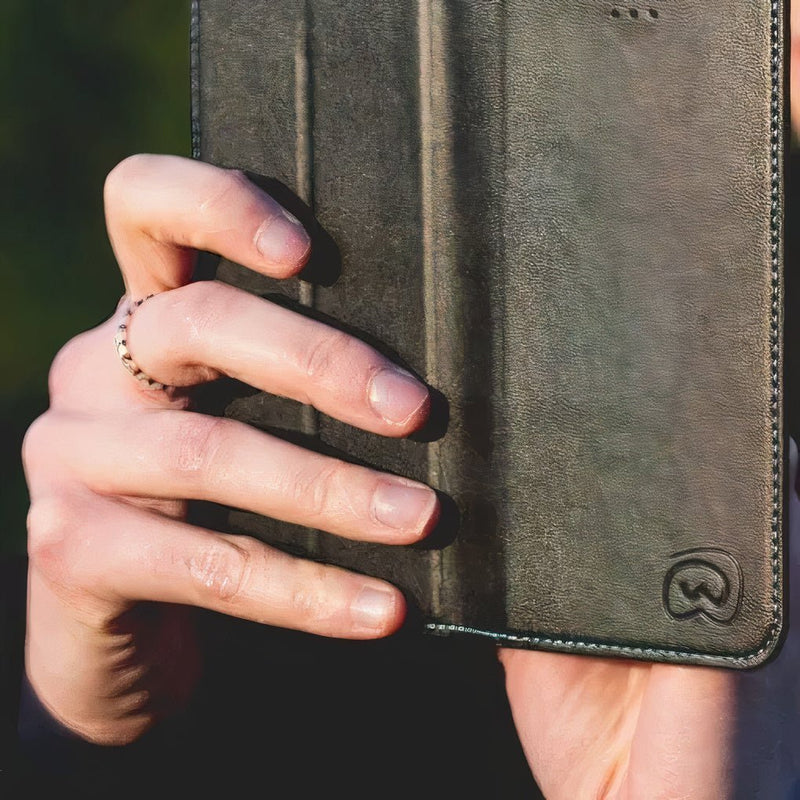 EMF Phone Case being used in public taking photos of nature